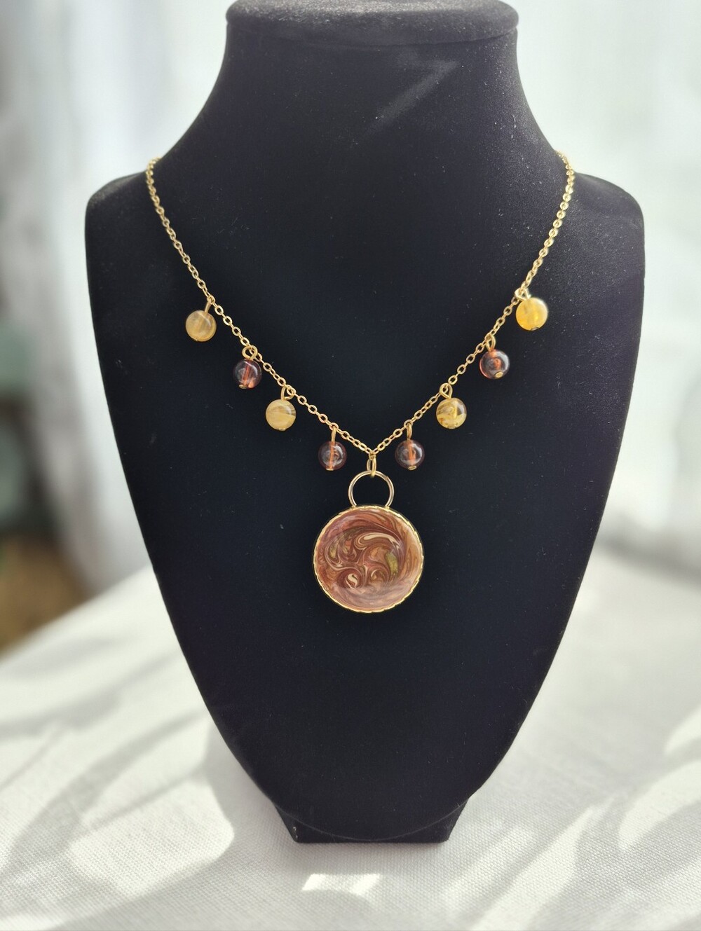 Reimagined Goldtone Swirl Pendant Necklace